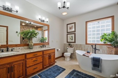 Experience exceptional lakefront living in this custom-built - photo 17