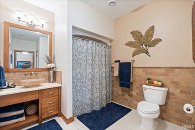Experience exceptional lakefront living in this custom-built - photo 24