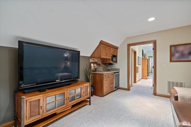 Experience exceptional lakefront living in this custom-built - photo 30