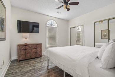 Welcome to this beautiful first-floor end-unit condo in the - photo 2