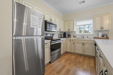 Welcome to this beautiful first-floor end-unit condo in the - photo 6
