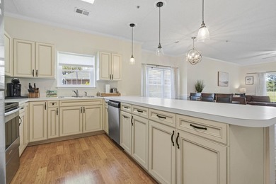 Welcome to this beautiful first-floor end-unit condo in the - photo 7