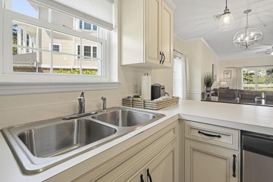 Welcome to this beautiful first-floor end-unit condo in the - photo 9