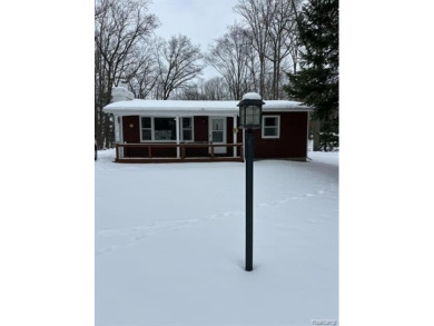 Lake Home For Sale in Gladwin, Michigan