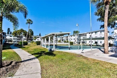 Spacious 2/2 condo with a rare floor plan that includes a large - photo 2