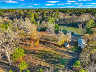 This 9.75ac m/l of unrestricted waterfront property on the - Lake Home For Sale in Jasper, Texas