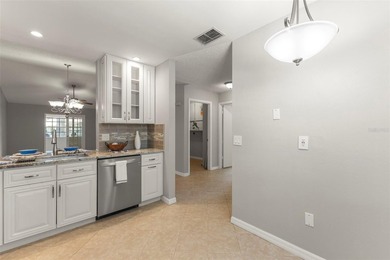 Virtually Staged. Tucked within a beautifully maintained - photo 8