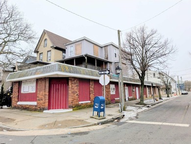 Mixed-use corner commercial property available for a cash buyer - photo 1