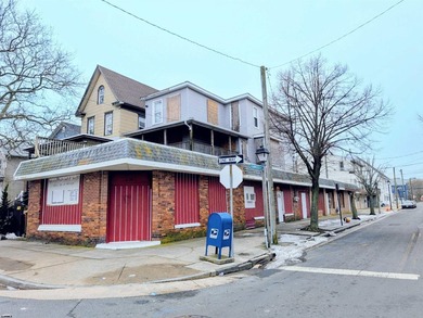 Mixed-use corner commercial property available for a cash buyer - photo 3