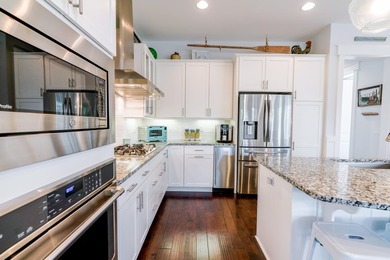Exquisite Pond-Front Luxury in NatureWalk | 2 Primary Suites | - photo 16