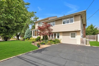 Updated 4-bedroom, 2.5-bath split-level home in Oceanside - - photo 2