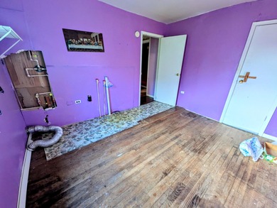 This older farm house sits on 6 beautiful acres of flat open