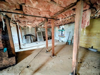 This older farm house sits on 6 beautiful acres of flat open