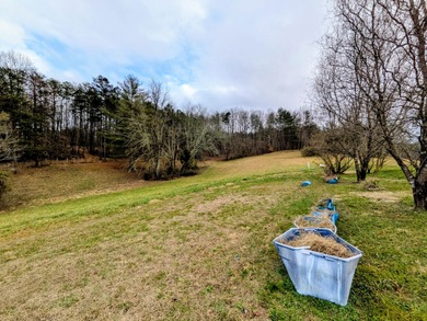 This older farm house sits on 6 beautiful acres of flat open