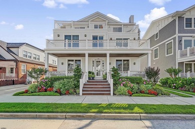 JUST FOUR HOMES FROM THE BEACH! Welcome to one of the most - photo 1