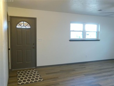 A MUST SEE!! This beautiful home has been updated with much