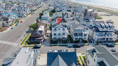 JUST FOUR HOMES FROM THE BEACH! Welcome to one of the most - photo 4