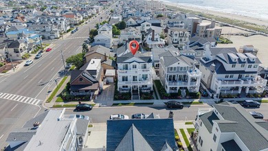 JUST FOUR HOMES FROM THE BEACH! Welcome to one of the most - photo 4
