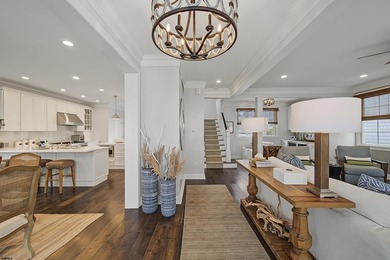 JUST FOUR HOMES FROM THE BEACH! Welcome to one of the most - photo 6
