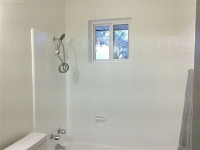 A MUST SEE!! This beautiful home has been updated with much