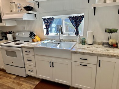 Wonderful upgraded 3 bedroom 1 bathroom home in Westwood! Step - photo 11