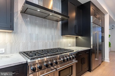 Introducing a rare, newly constructed luxury townhome discreetly