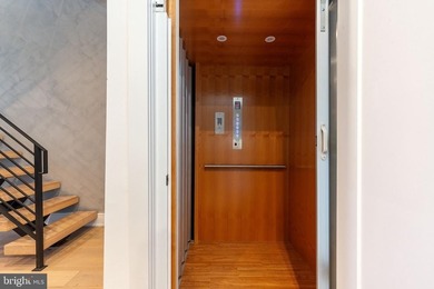 Introducing a rare, newly constructed luxury townhome discreetly