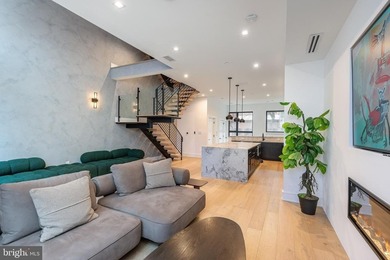 Introducing a rare, newly constructed luxury townhome discreetly