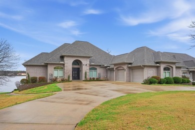 Experience lakefront living in Benton's prestigious Hurricane