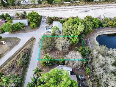 This 0.20-acre oversized residential lot is located in the - photo 11