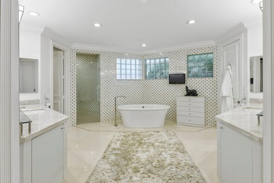 This stunning 2-story, 6-bedroom residence is nestled at the end - photo 32