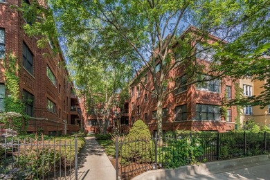 Nestled within a charming all-brick courtyard building, this - photo 1