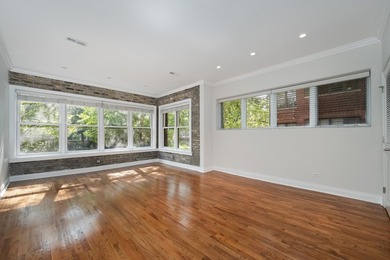 Nestled within a charming all-brick courtyard building, this - photo 3