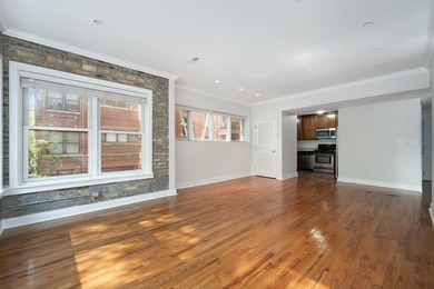Nestled within a charming all-brick courtyard building, this - photo 5