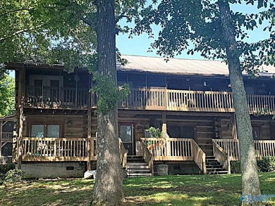 Enjoy lakeside living in this cozy yet upgraded 2nd-story log - photo 5