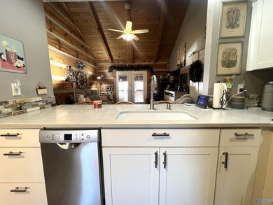 Enjoy lakeside living in this cozy yet upgraded 2nd-story log - photo 7