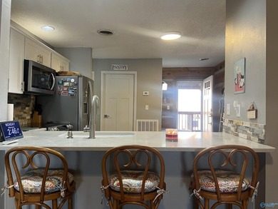 Enjoy lakeside living in this cozy yet upgraded 2nd-story log - photo 8