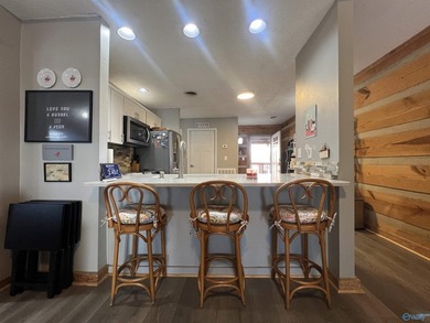 Enjoy lakeside living in this cozy yet upgraded 2nd-story log - photo 9