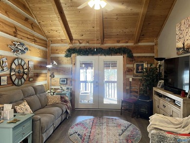 Enjoy lakeside living in this cozy yet upgraded 2nd-story log - photo 10