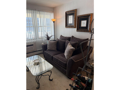Welcome to Unit 106 at 132 S. Providence Avenue, a charming and - photo 3