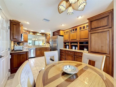 Located in the exclusive Village of Briar Meadow, this - photo 4
