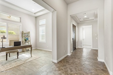 Nestled on a premium golf course lot within the exclusive gated - photo 16