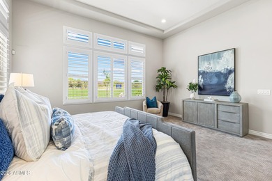 Nestled on a premium golf course lot within the exclusive gated - photo 17