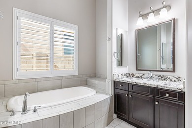 Nestled on a premium golf course lot within the exclusive gated - photo 21