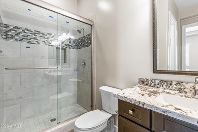Nestled on a premium golf course lot within the exclusive gated - photo 23