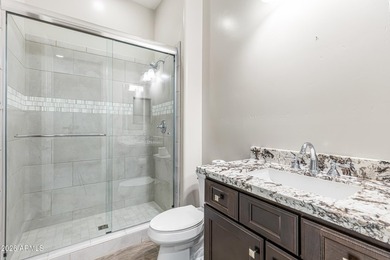 Nestled on a premium golf course lot within the exclusive gated - photo 24
