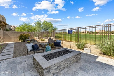 Nestled on a premium golf course lot within the exclusive gated - photo 32