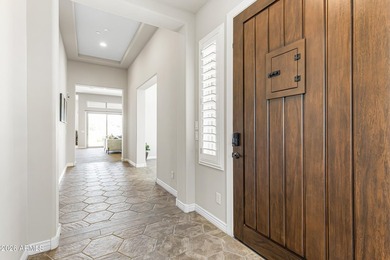 Nestled on a premium golf course lot within the exclusive gated - photo 41