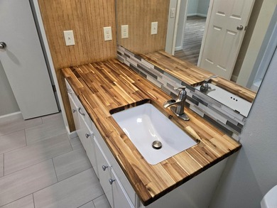 ACREAGE. Check out this newly remodeled light-filled home on - photo 41