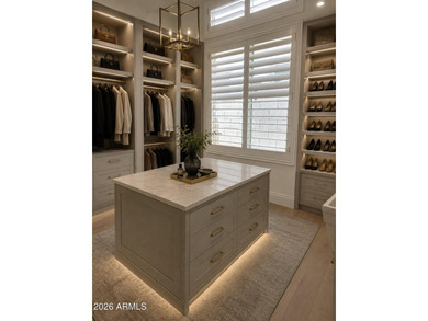 Nestled on a premium golf course lot within the exclusive gated - photo 45